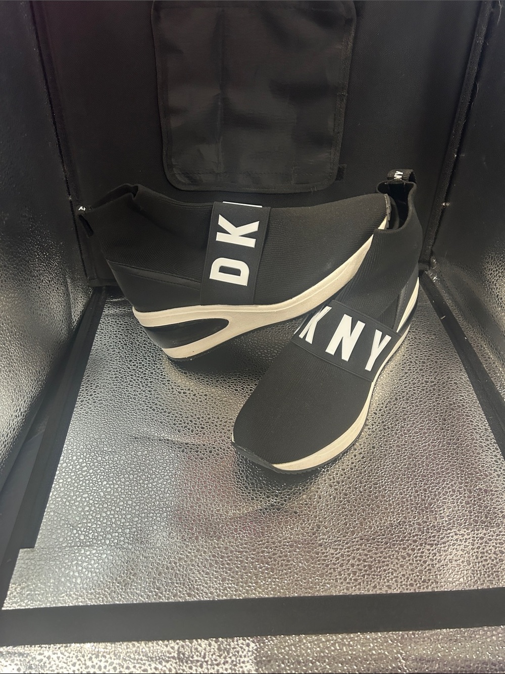 DKNY Black and White Wedge Slip-On Sneakers
